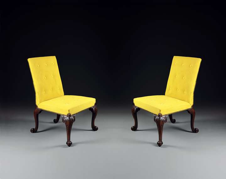 A Rare Pair of Period Carved Mahogany Side Chairs of Exceptional Colour and Patination